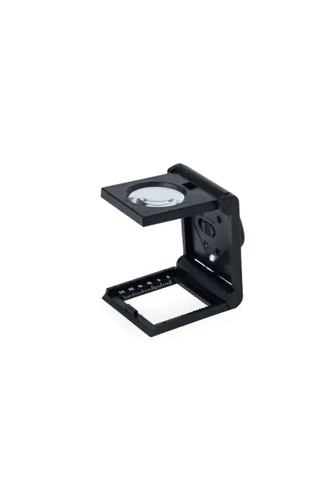 Makito Tudels · Lupa con luz y regla